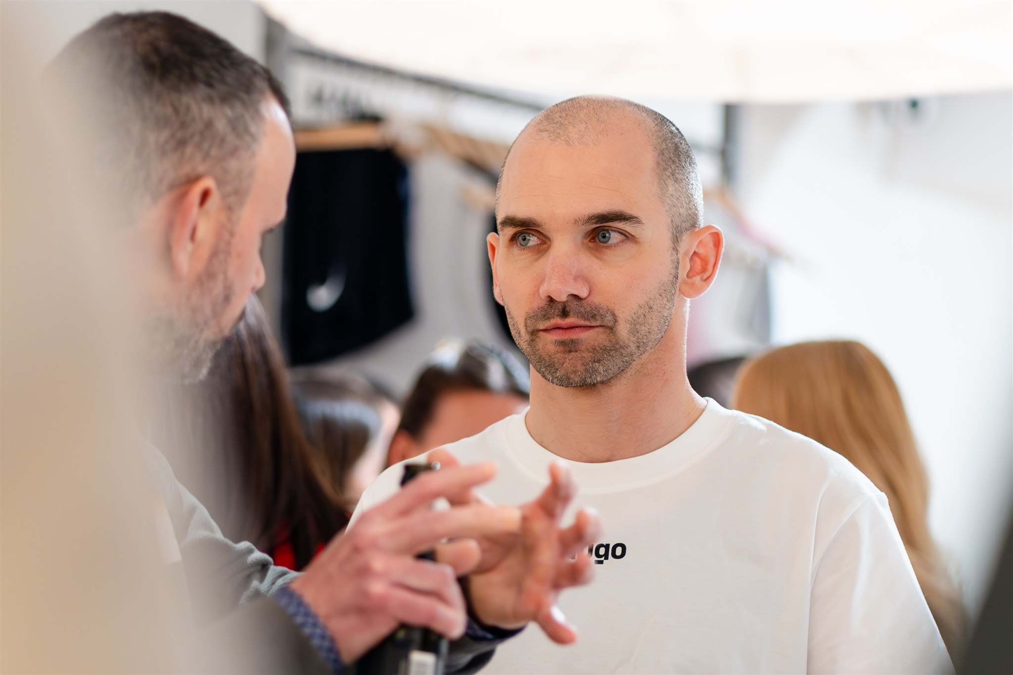 Focused discussion between guests at product launch Zurich