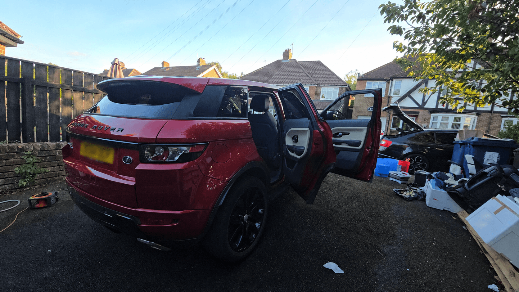 Red Range Rover Evoque after interior and complimentary exterior detailing