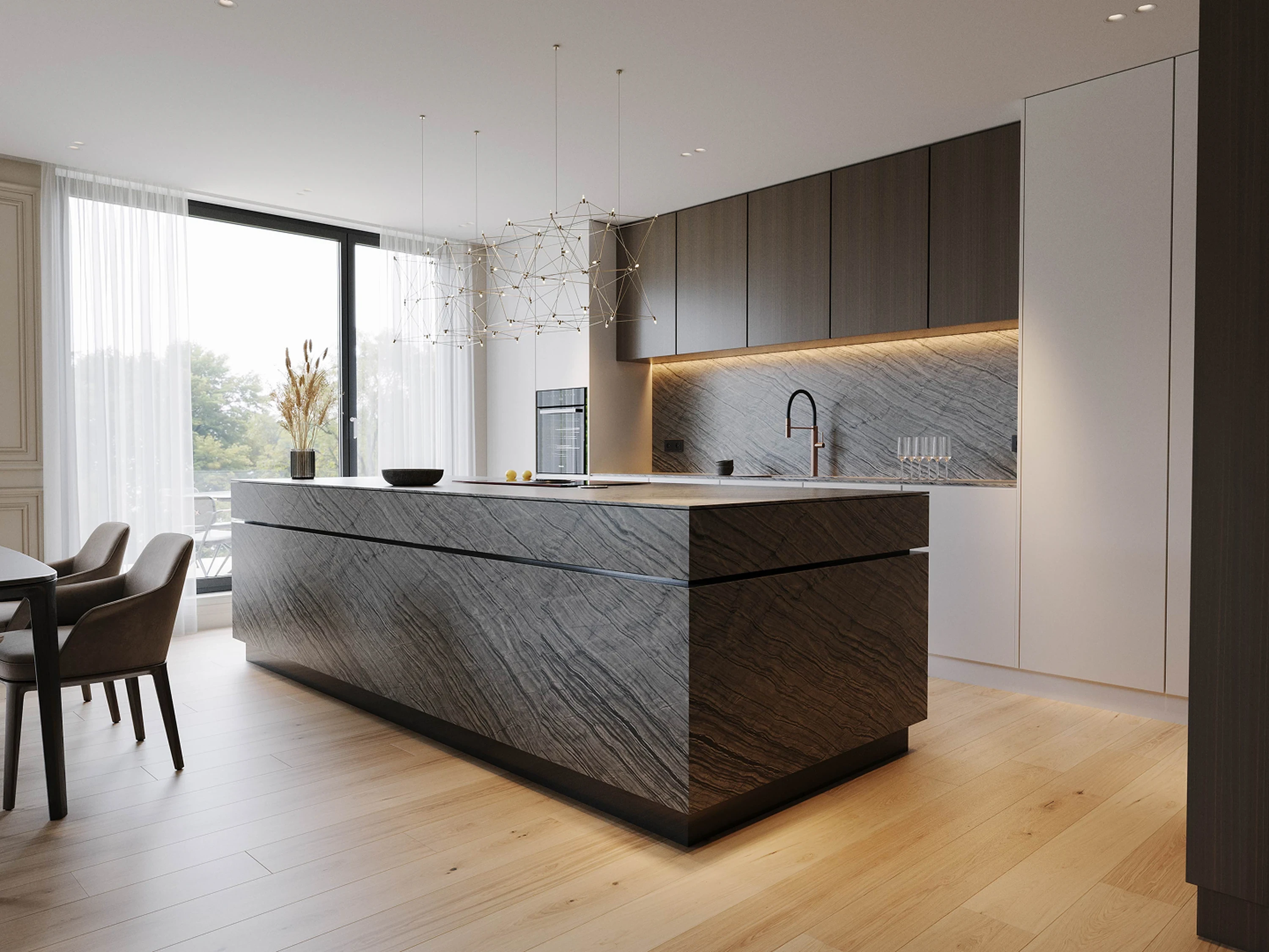 Cuisine — façades lisses et plan de travail en bois.