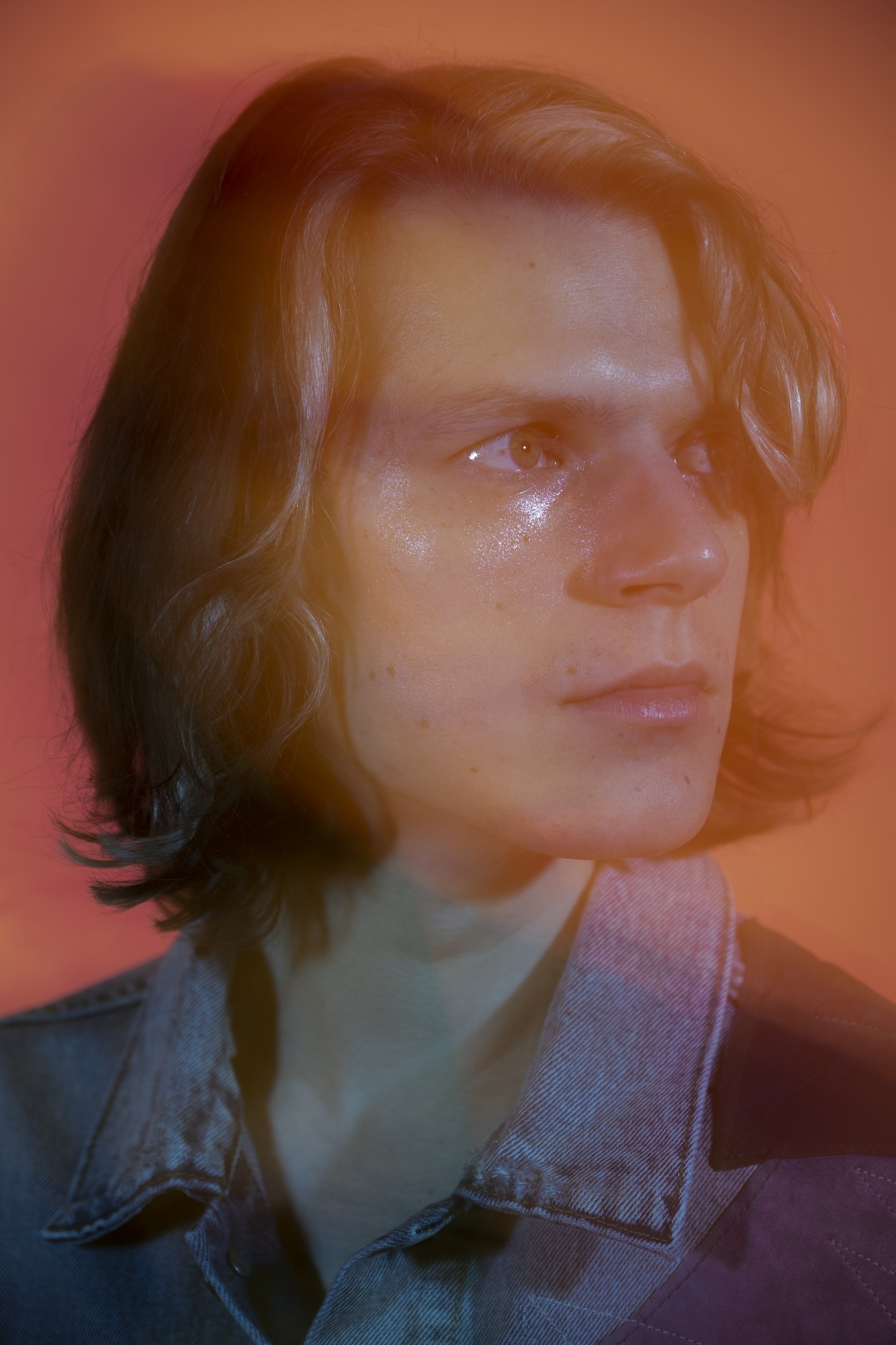 Close portrait of Kimchii with layered exposures and warm coloured light