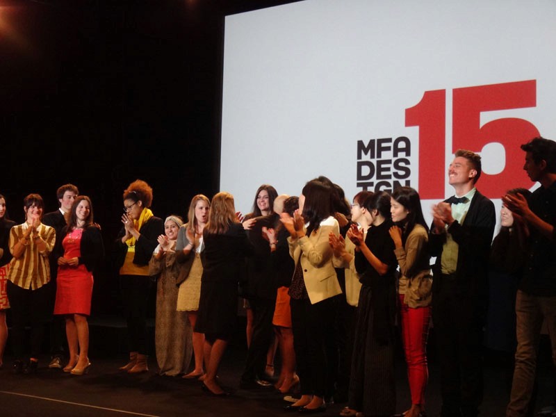 students on the stage at the end of the presentation