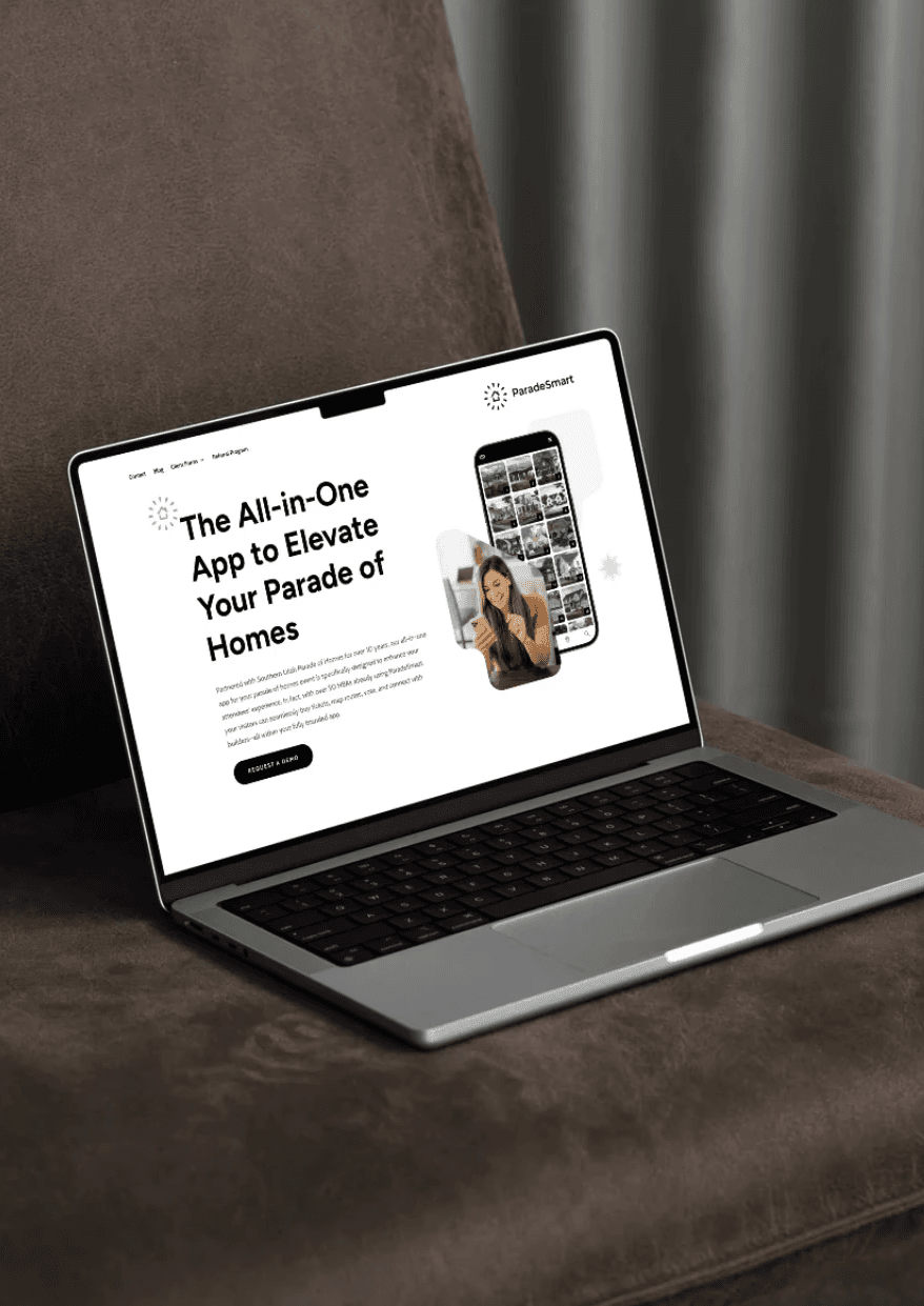 Laptop displaying ParadeSmart app "Elevate Your Parade of Homes"