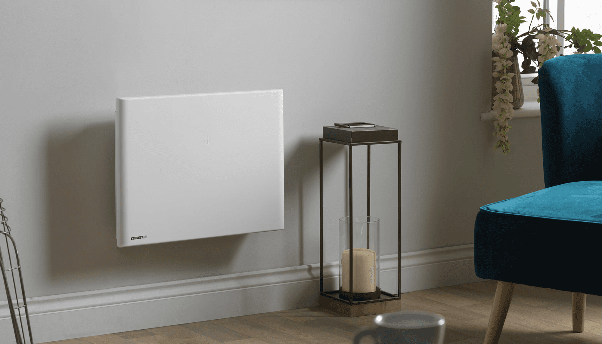 ConvectAir slim profile wall mounted electric panel heater installed in modern residential interior in British Columbia