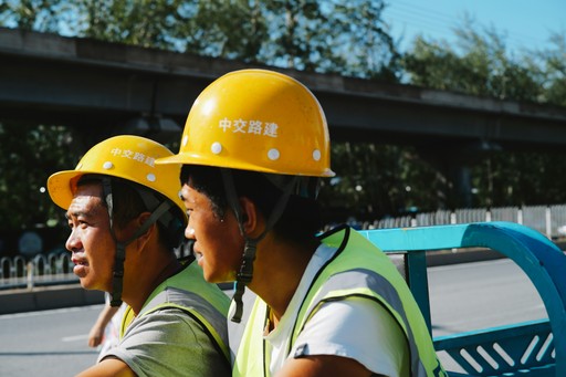 white top mount refrigerator beside white wall