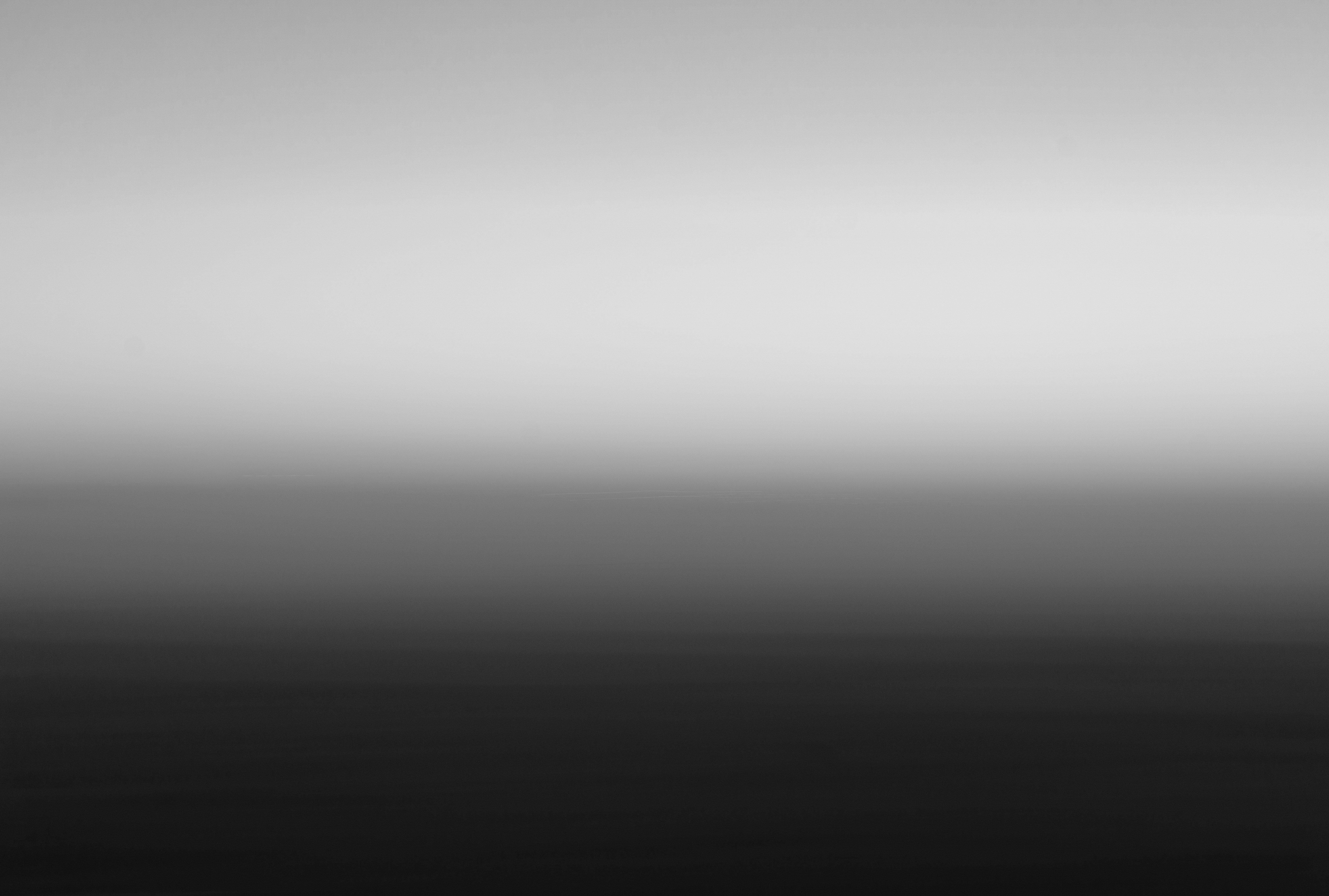 black round ball on white surface