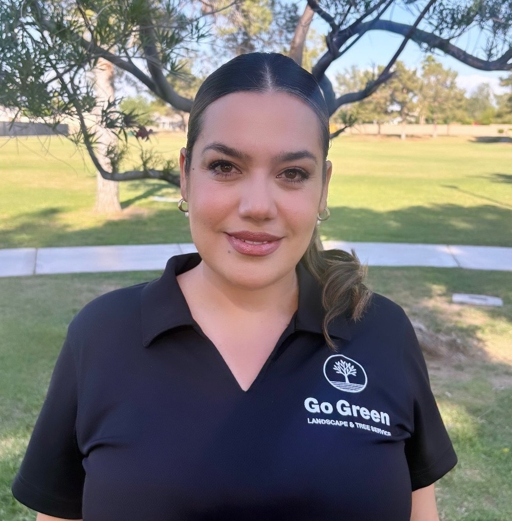 woman in red cardigan smiling