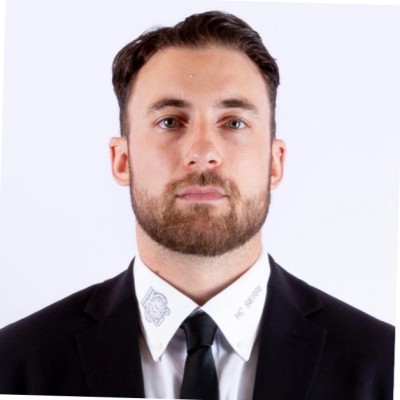 man standing in front of window