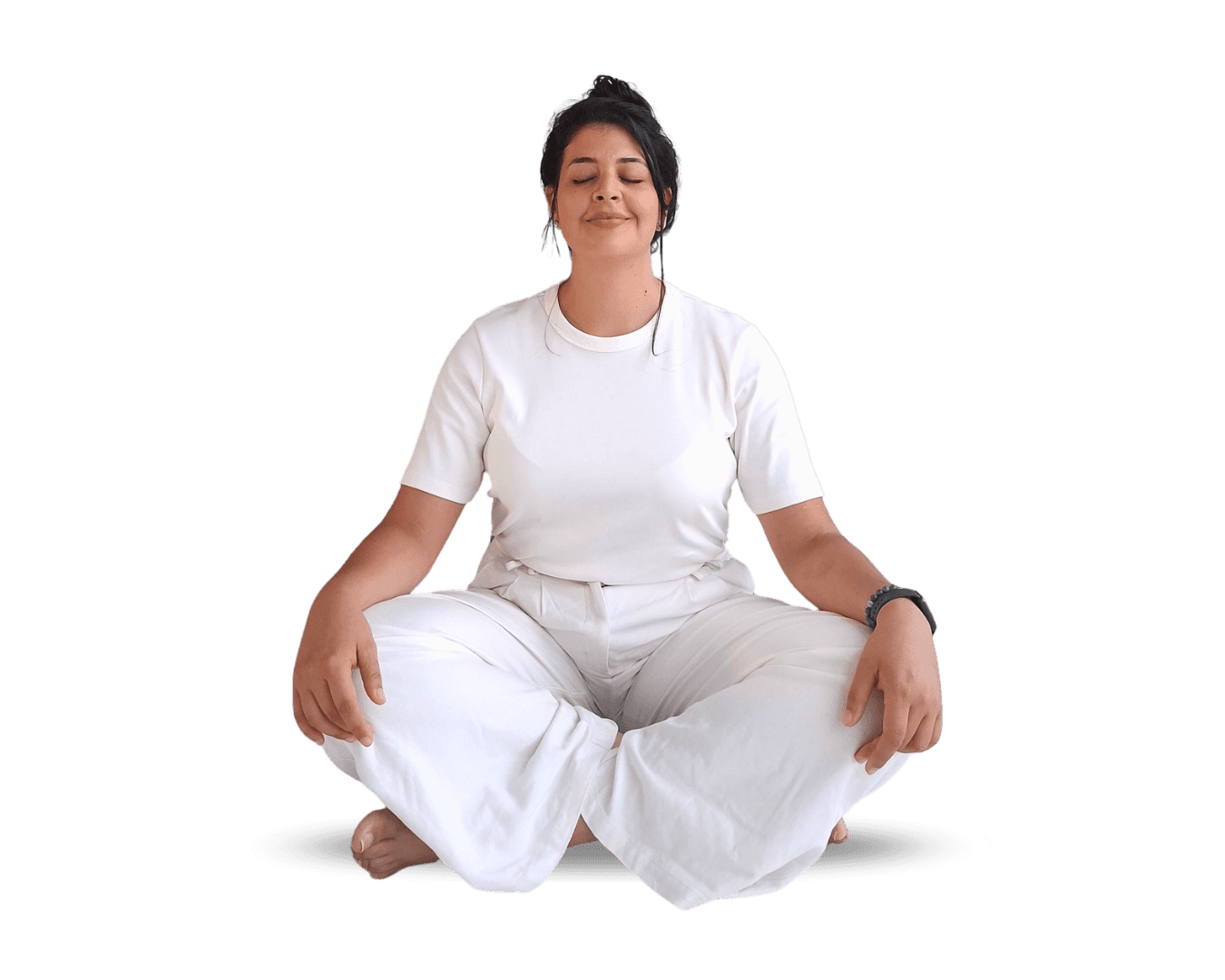 A woman sits cross-legged with eyes closed, wearing a white blouse and a long purple skirt, looking serene.