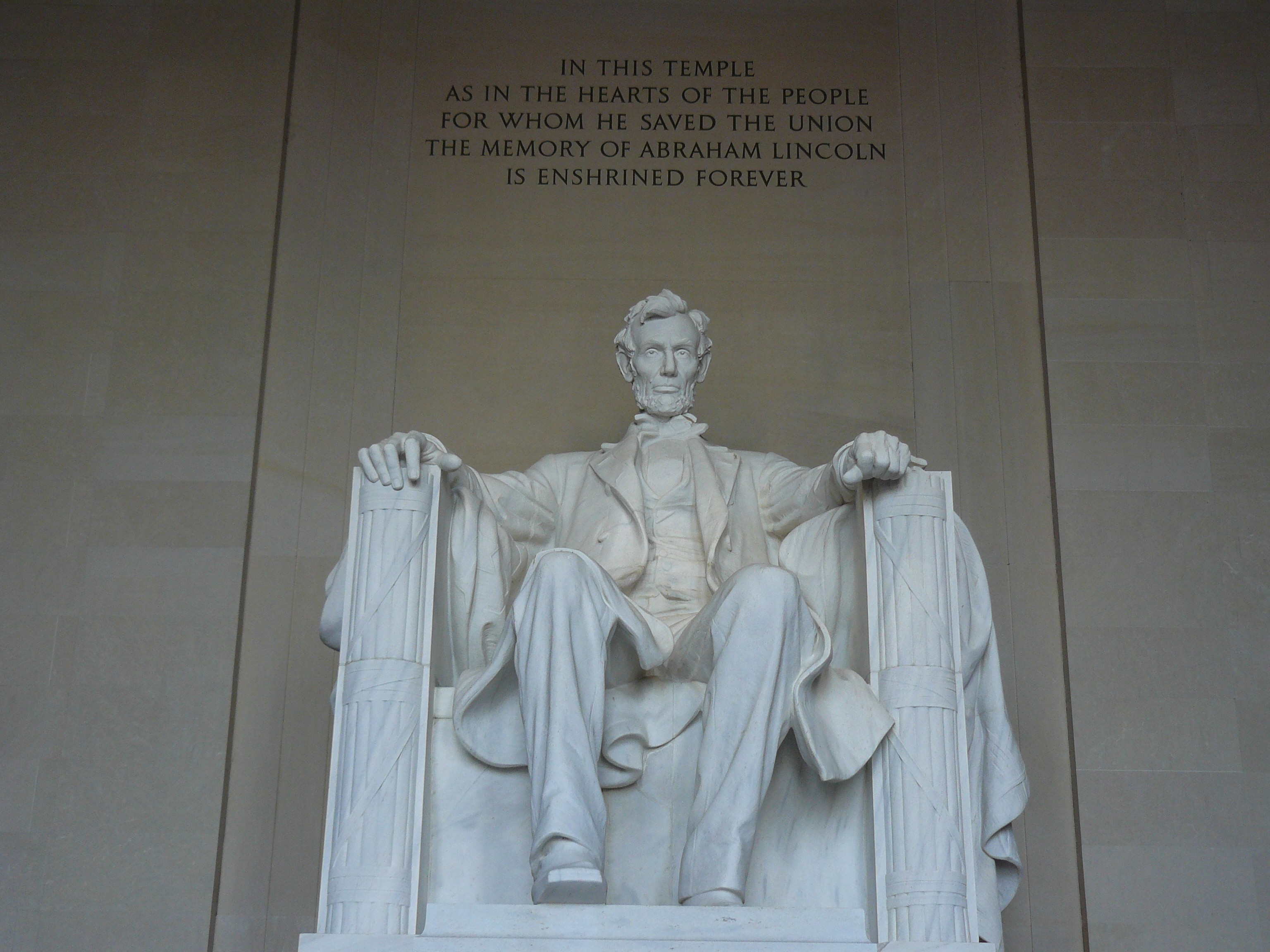 Triathlete on a time trial bike riding on a road