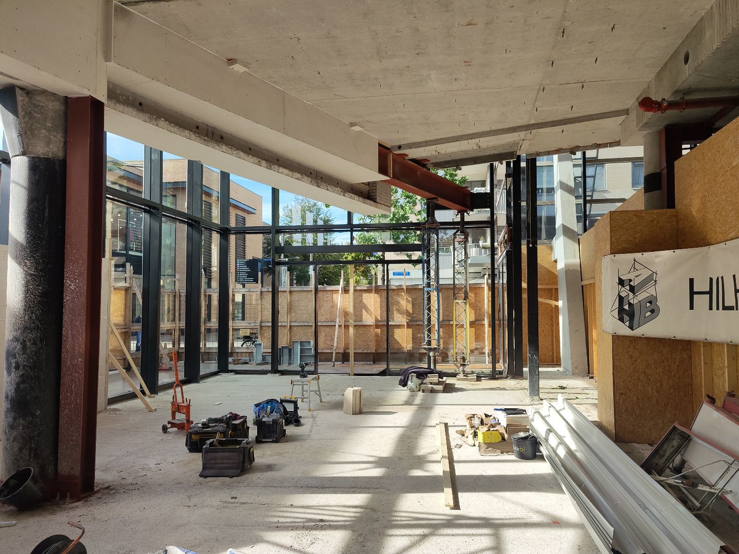 white wooden shelf near white wall