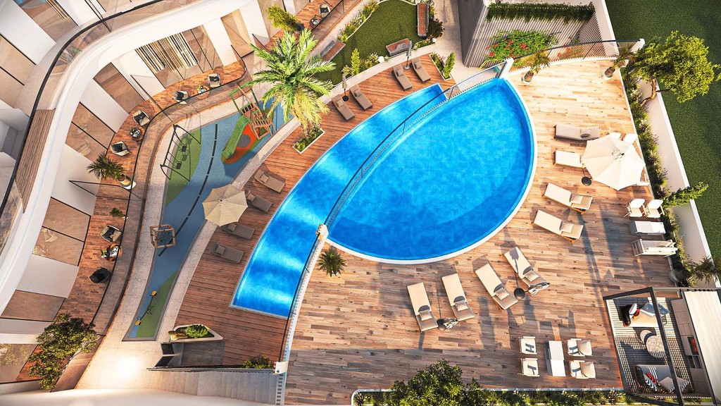 Conceptual artwork of Xenia Residences, showcasing a contemporary apartment building surrounded by greenery.