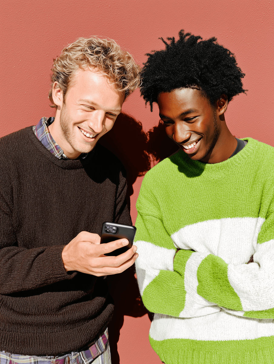 a close up of a person holding a cell phone