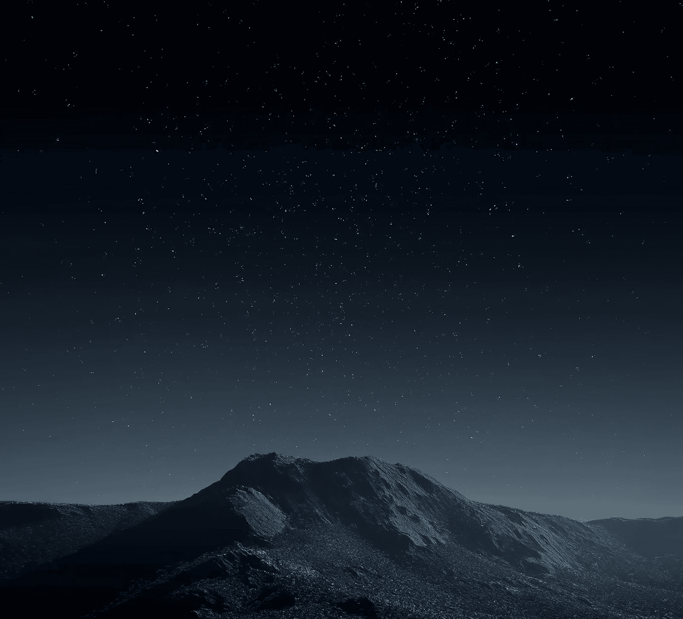 night-sky-over-distant-mountains