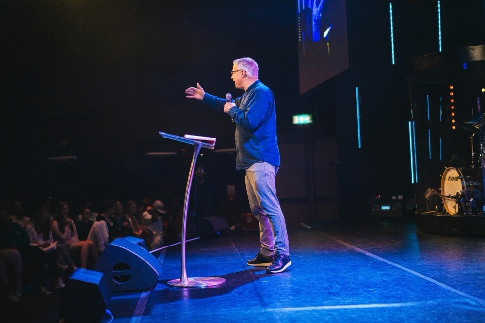 Pastor speaking on stage