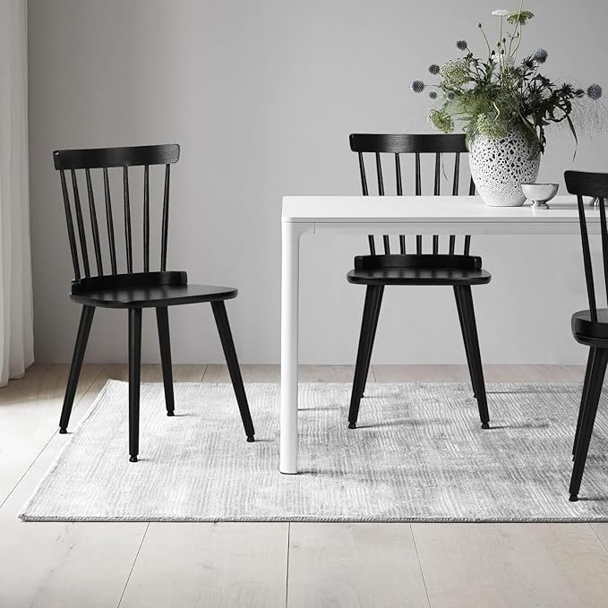 The high back windsor dining chair is a stylish addition that complements any interior design.