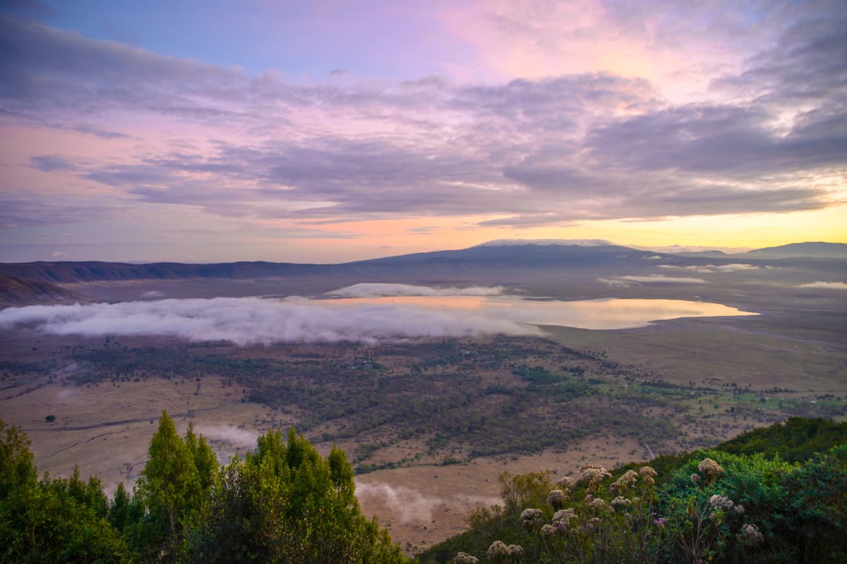 Guests at a Ngorongoro Crater rim lodge during a mid-range Tanzania safari extension.