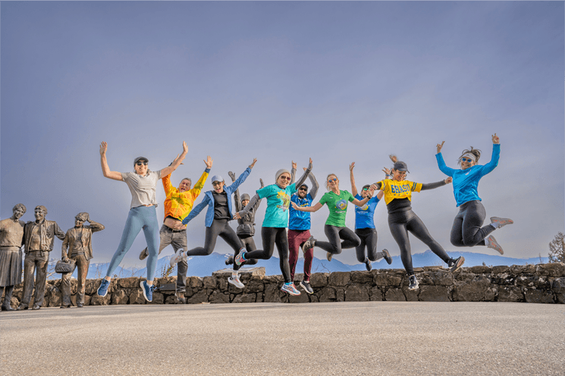 Group photo of all participants jumping together
