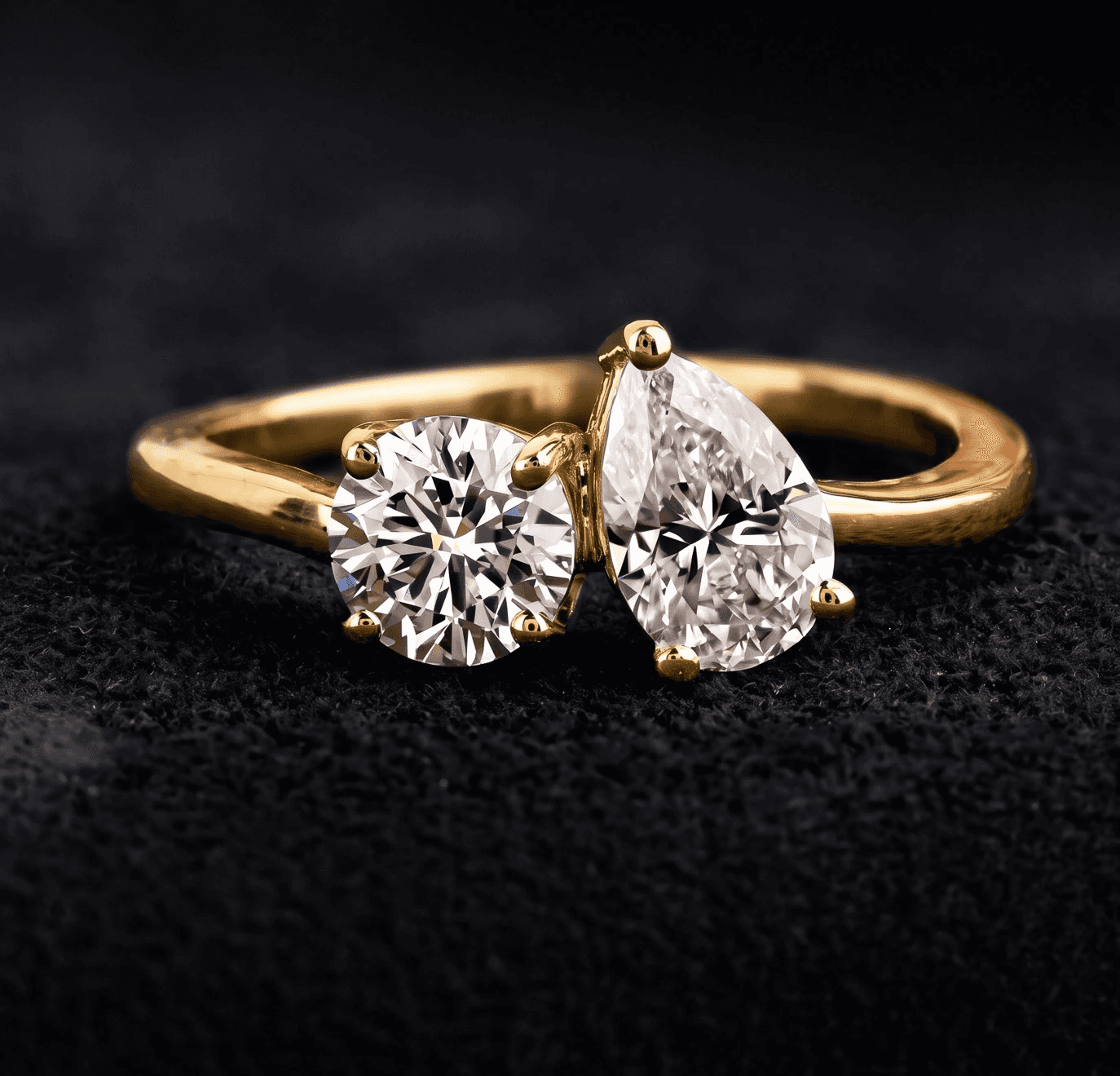 Close-up of a Round/Pear Toi-et-Moi ring from Lab Grown Dreams bangkok, custom-made for clients.