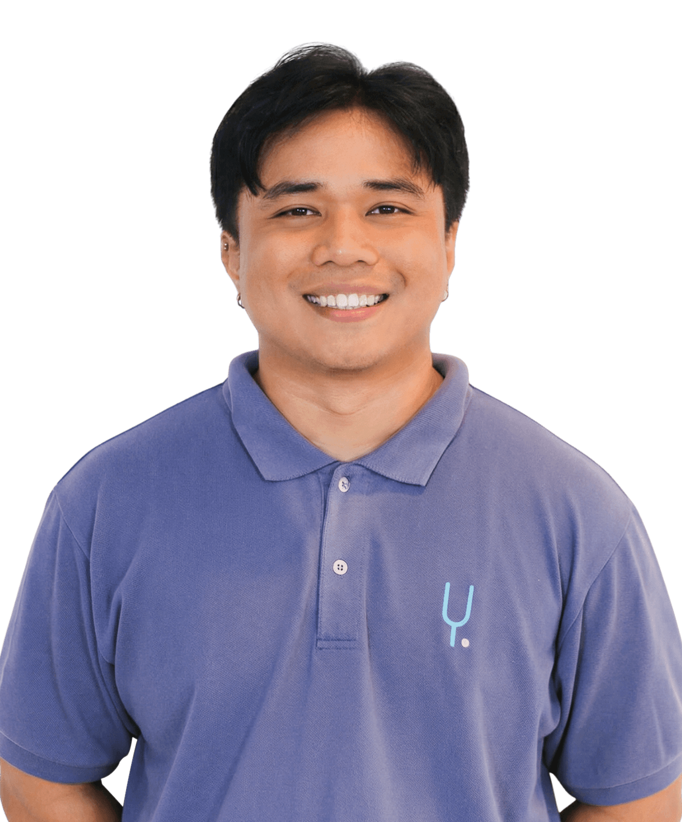A man with wavy dark hair wearing a gray Yoonet polo shirt and a black lanyard, smiling in front of a white background.
