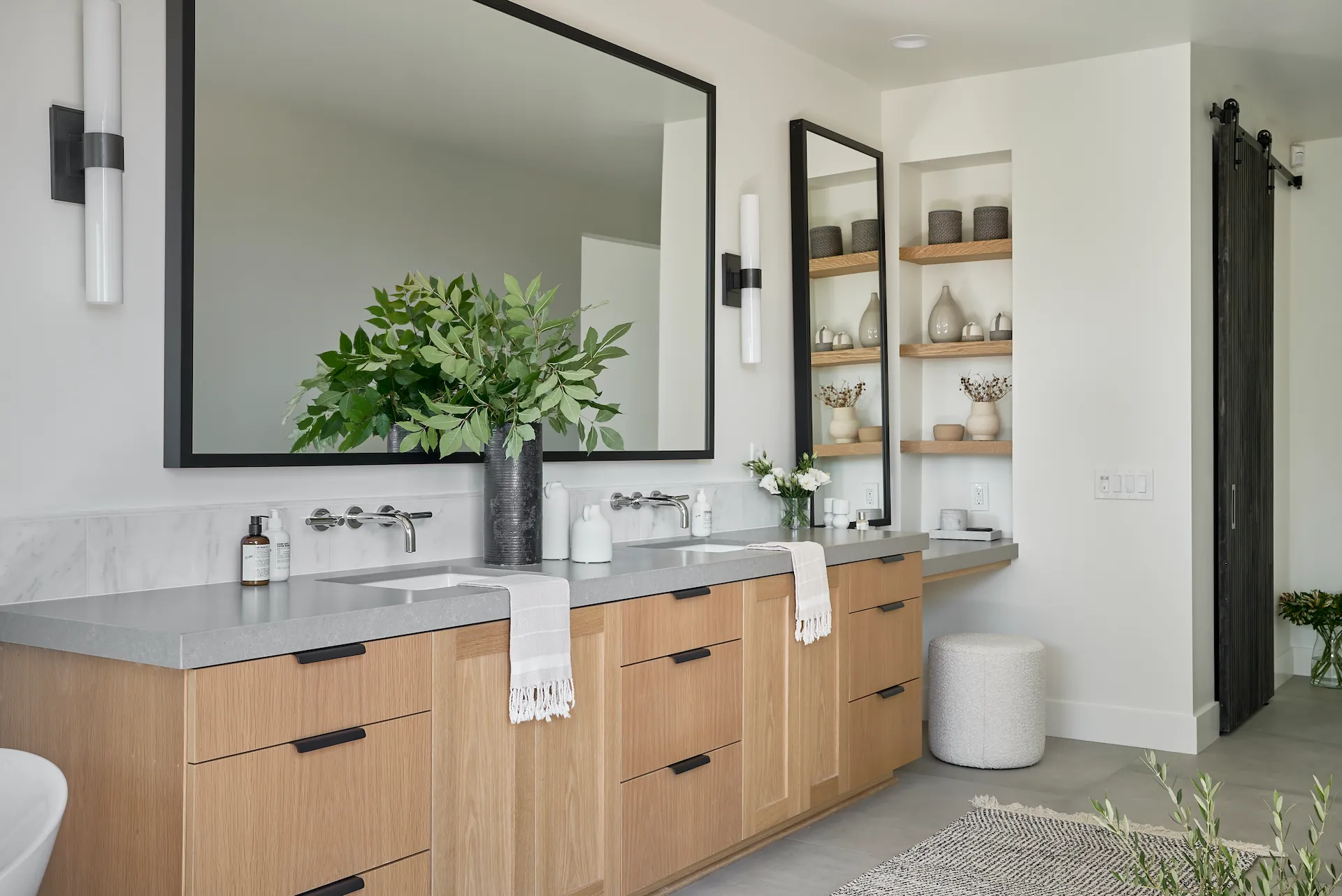 Primary bath in the Fullerton remodel viewed from the first angle, highlighting the double vanity. Photo by Todd Huge.