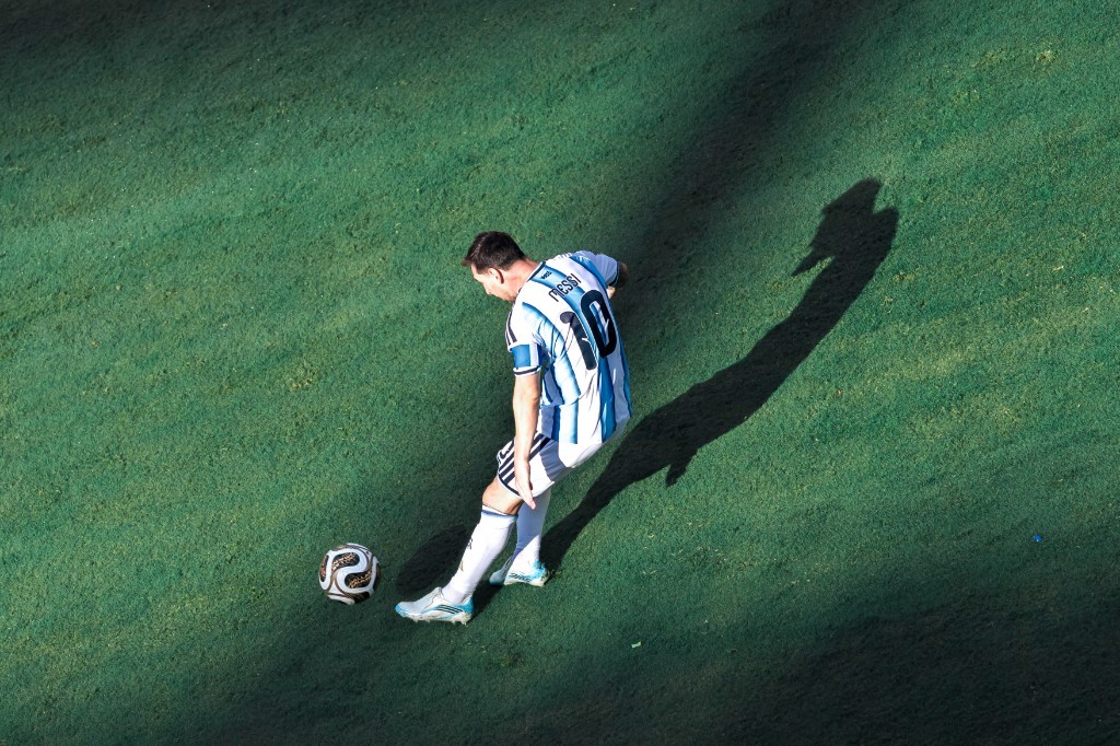 Lionel Messi prepares to strike the ball during Argentina's 2026 FIFA World Cup final against Spain
