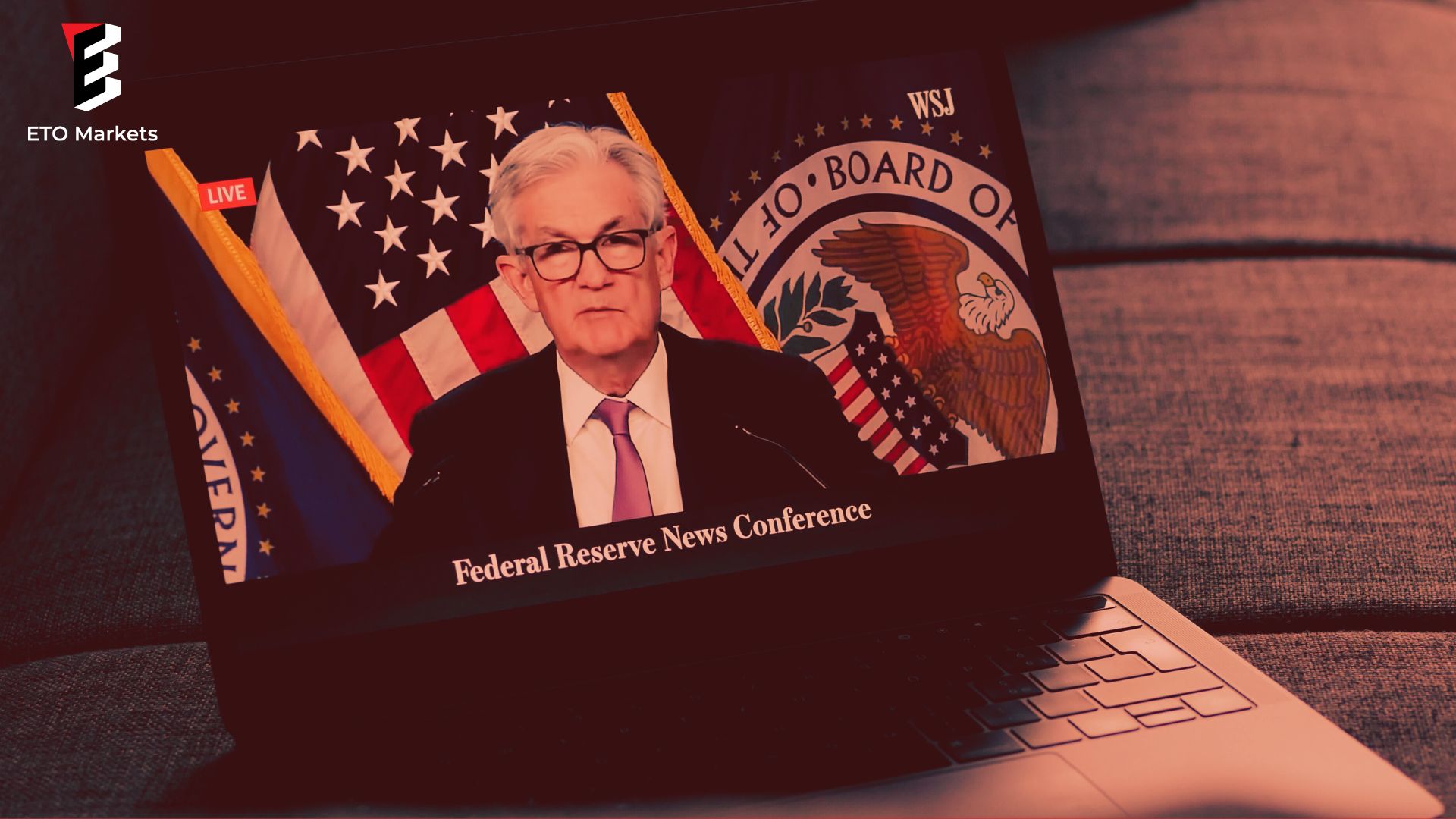 Image of Fed Chair Jerome Powell delivering a speech on the economy,