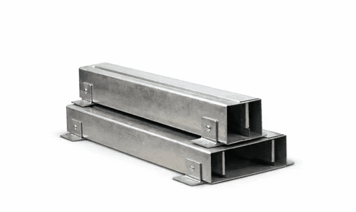Galvanized steel dunnage supports used as heavy-duty pallet blocks for industrial load stabilisation and transport.