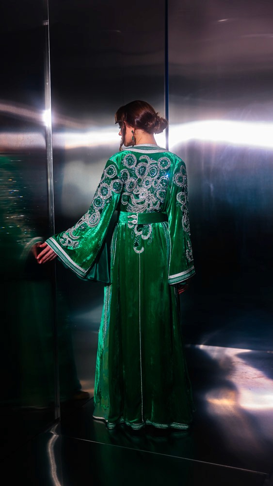 Emerald Moroccan caftan with silver hand embroidery, luxury handcrafted design prepared in Bahrain and finished by Moroccan artisans
