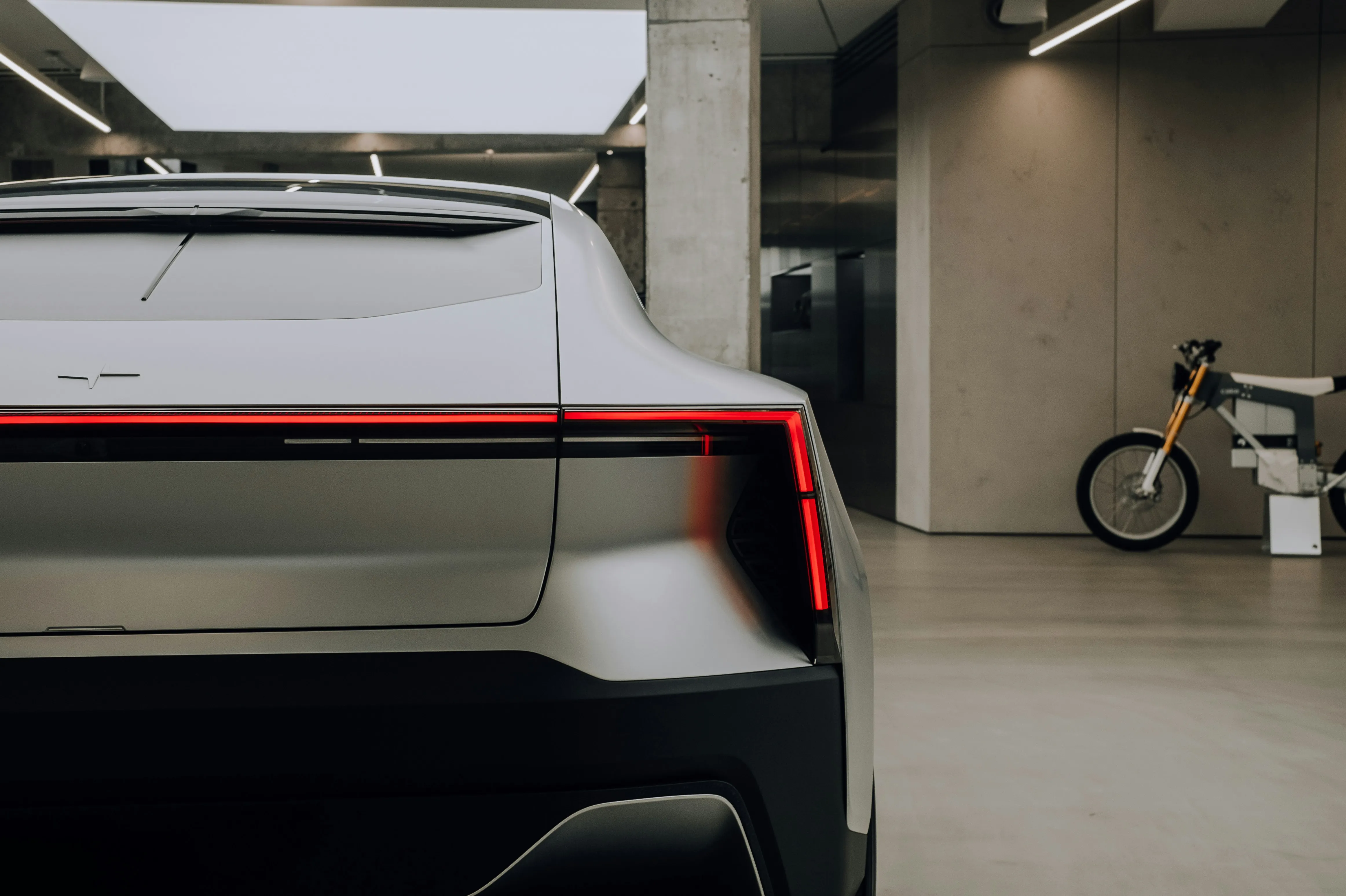 A silver car featuring a sleek