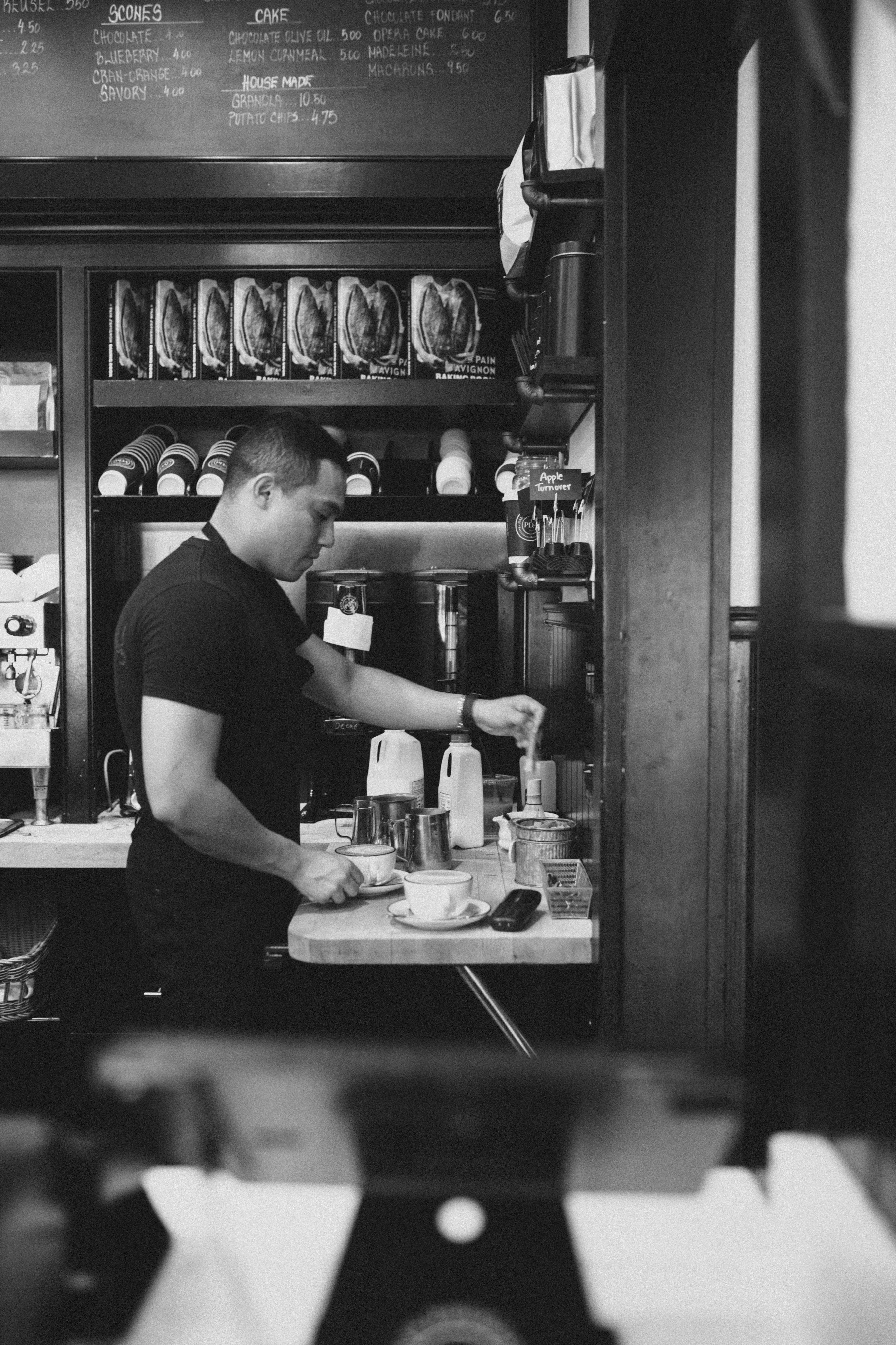 Pain d'Avignon café and bakery —fresh plain croissant and latte coffee