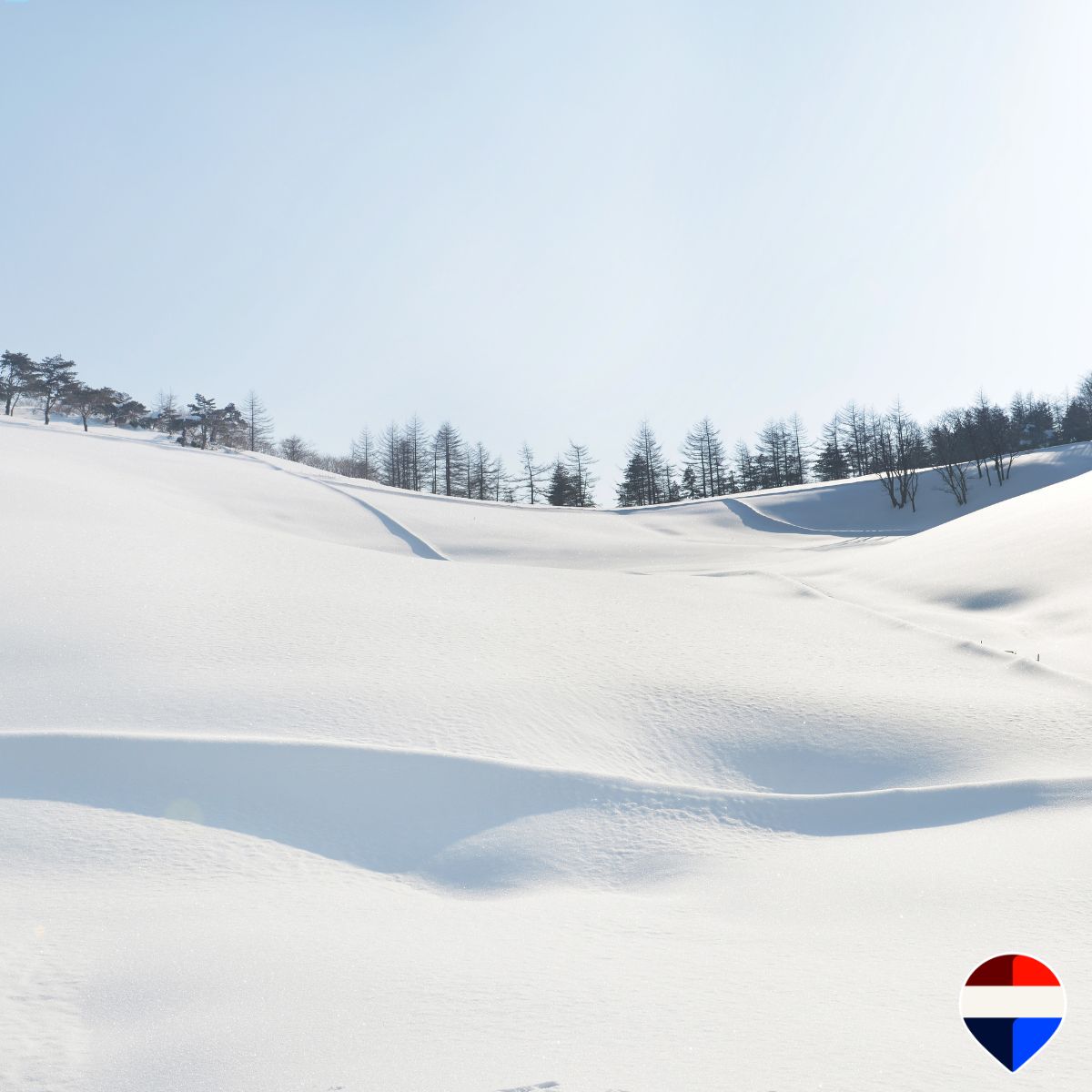 A snow-covered winter landscape in the hills of the Tuscan Maremma