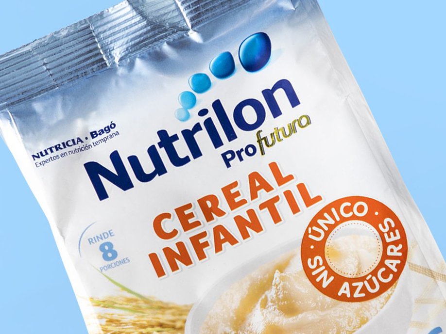 Rooftops of a coastal town with the sea in background