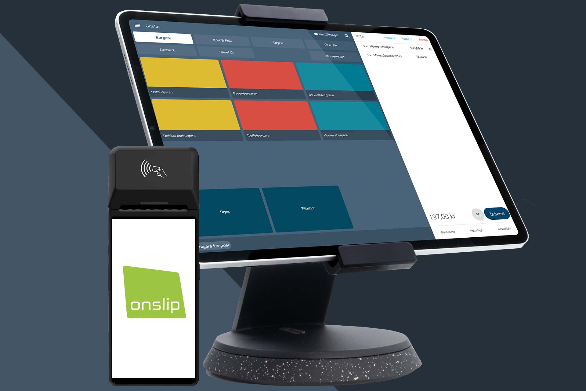 A young person with curly hair smiles at the camera while sitting in front of a laptop against a dark background.