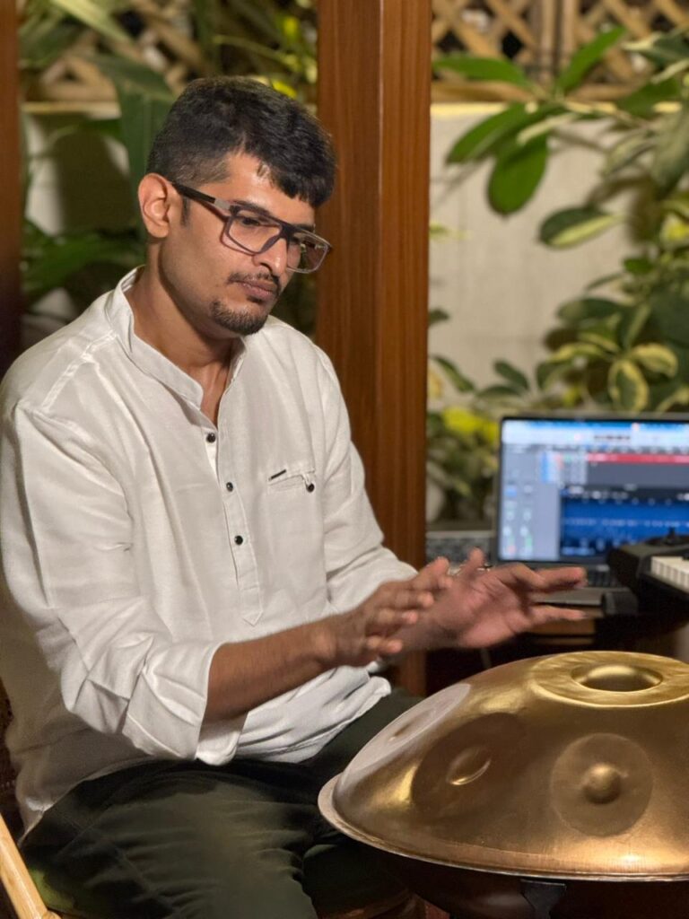 Sagar Belsare performing handpan during an ambient live music session in Pune