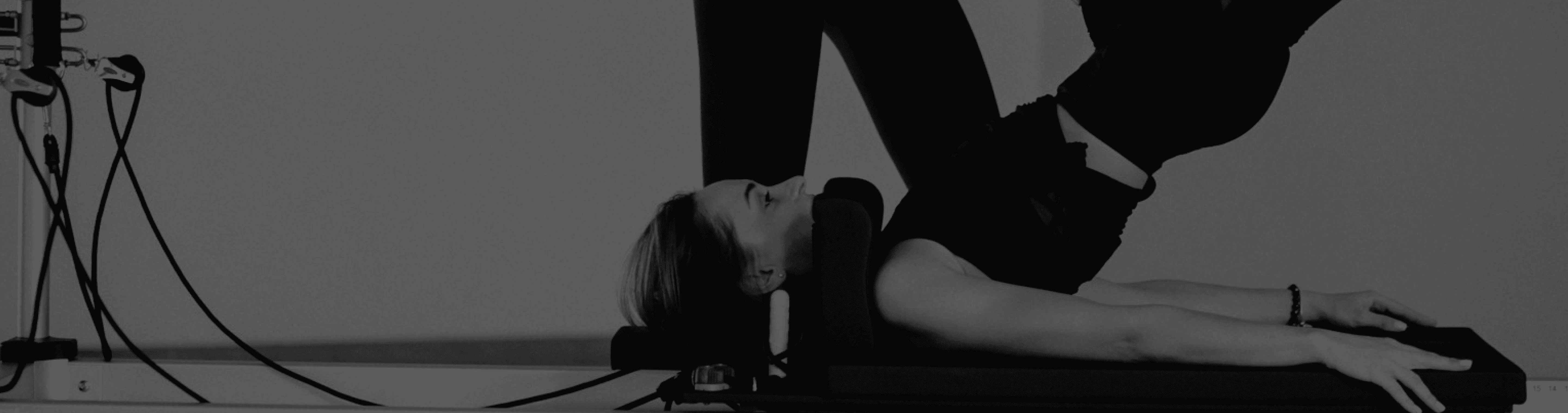Fit woman doing pilates workout