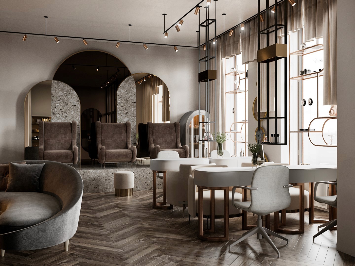 A modern, elegant salon interior features plush brown recliner chairs facing large, curved mirrors, with wooden herringbone flooring and sleek white manicure tables, creating a luxurious and inviting atmosphere.