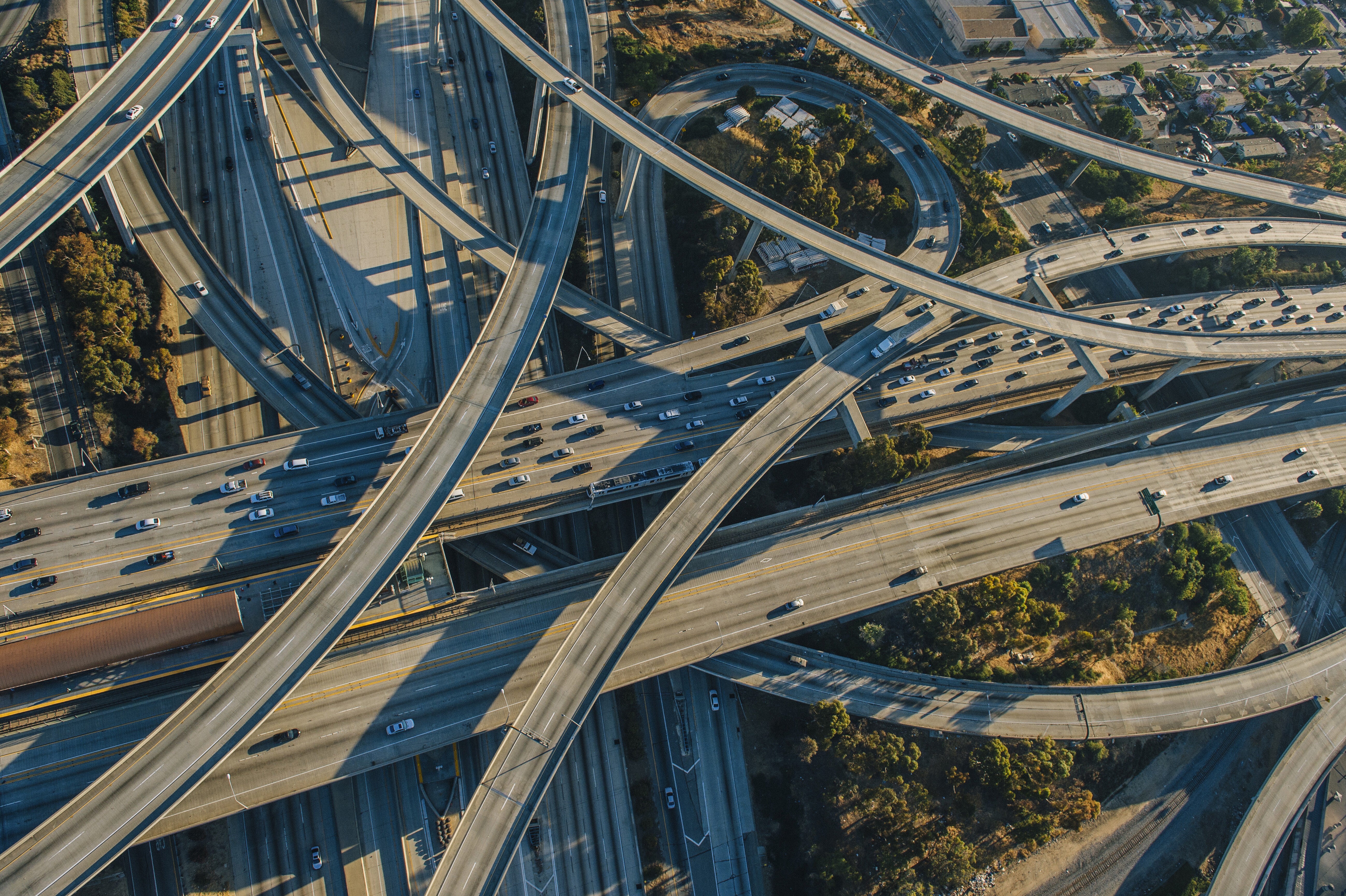 Birds eye view of a highway network during sunset.