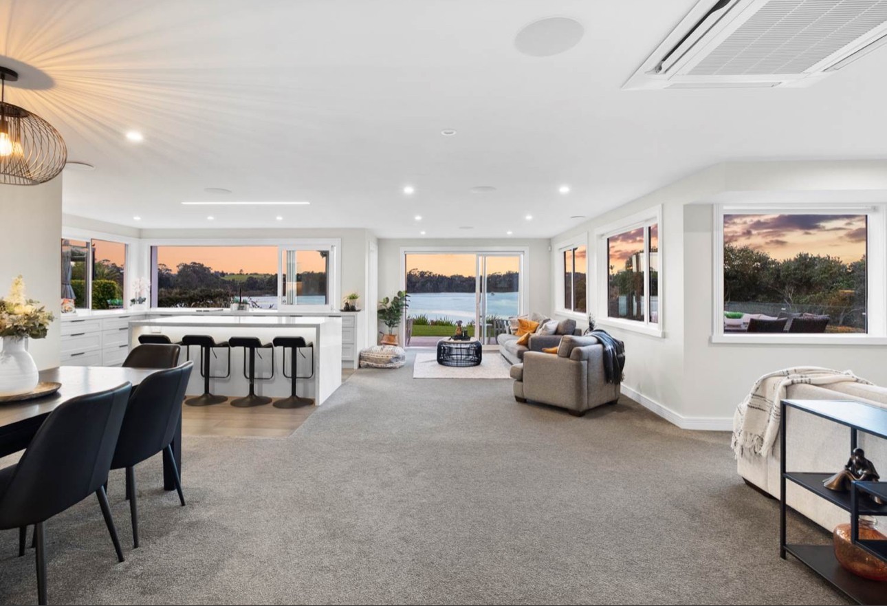 Newly installed plush gray carpet in a modern living room.