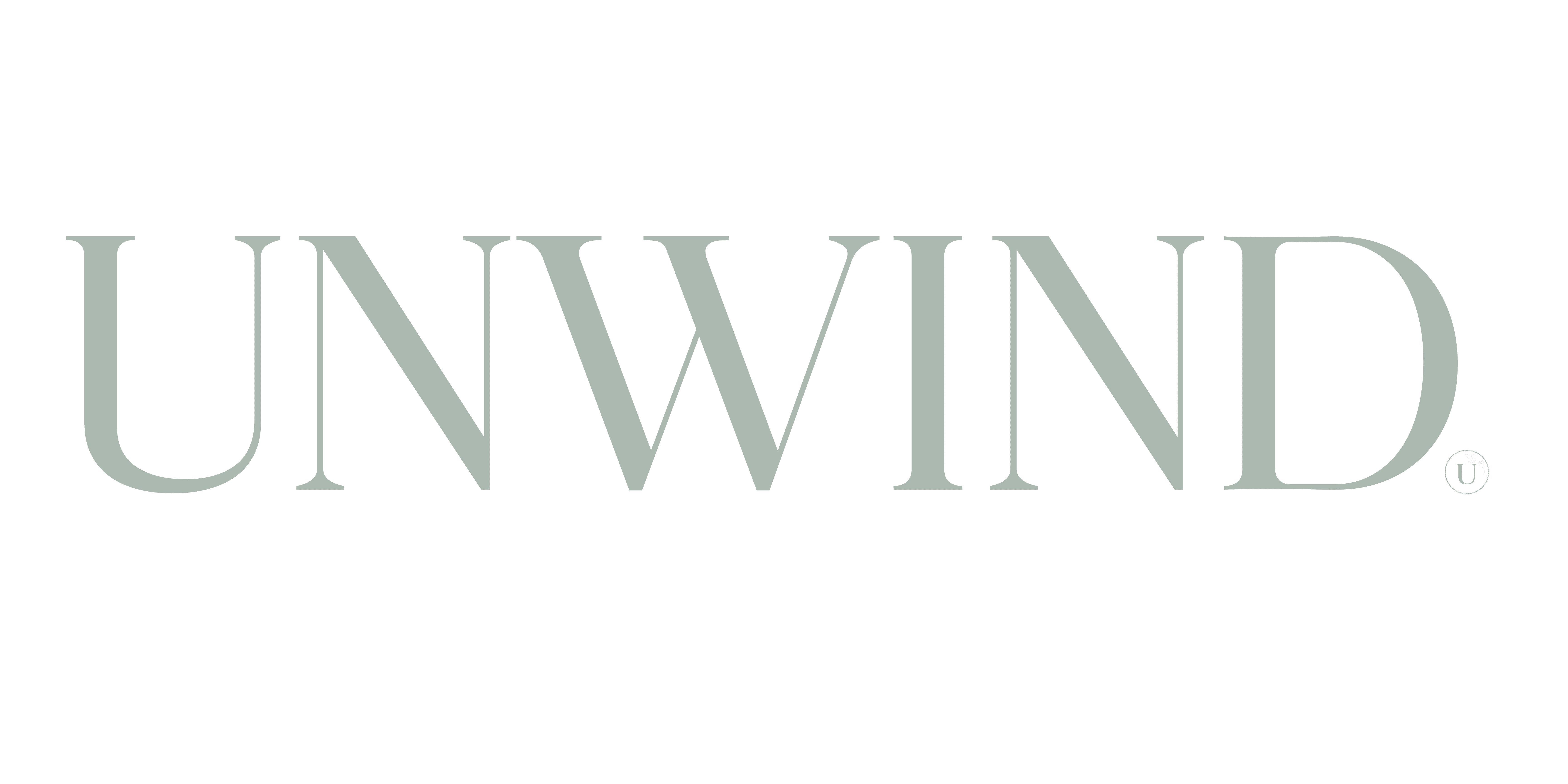 Photo of the word UNWIND in light green