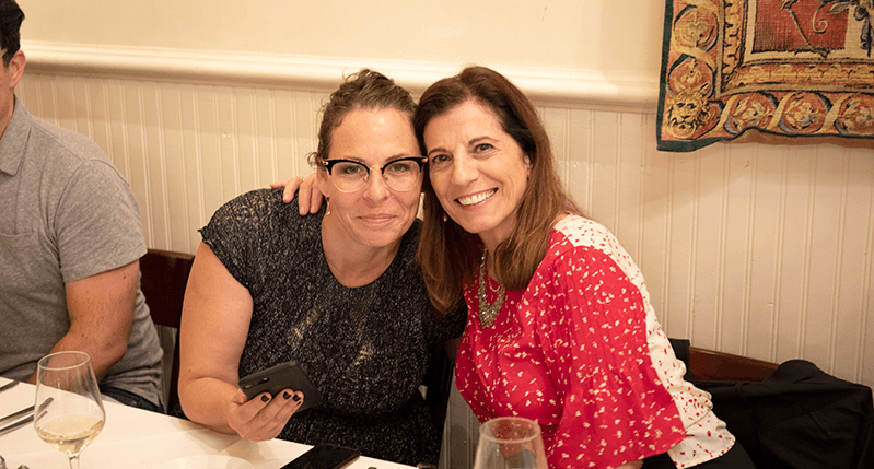 portrait of two women at the table