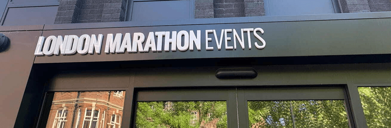 A large sign on a building door.