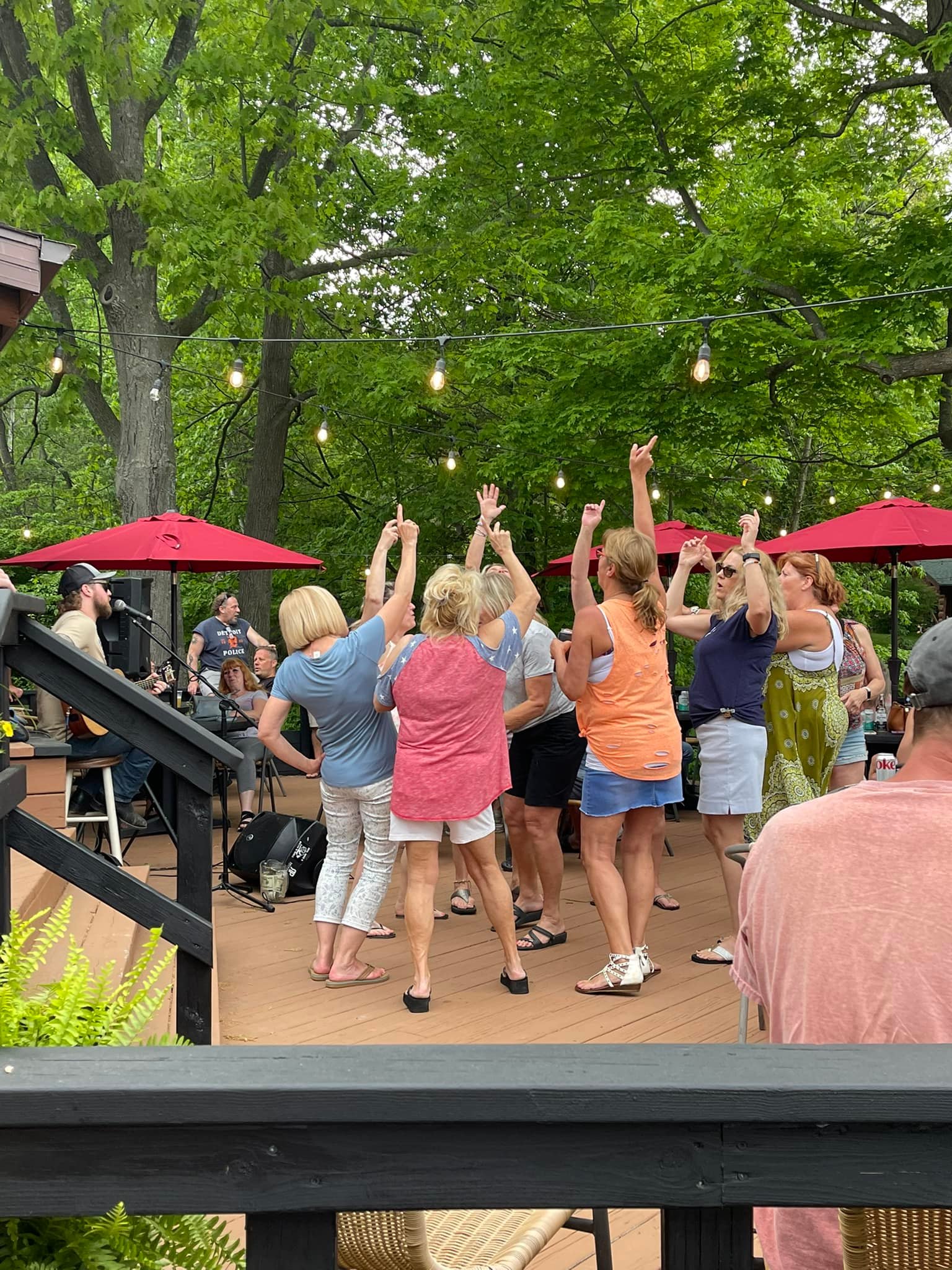 Woman pulling back a barstool