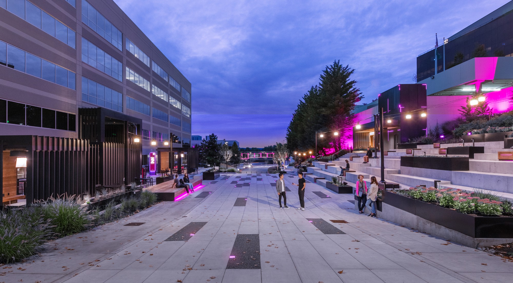 A perspective view looking down the former vehicular street, now reimagined as a vibrant pedestrian plaza.