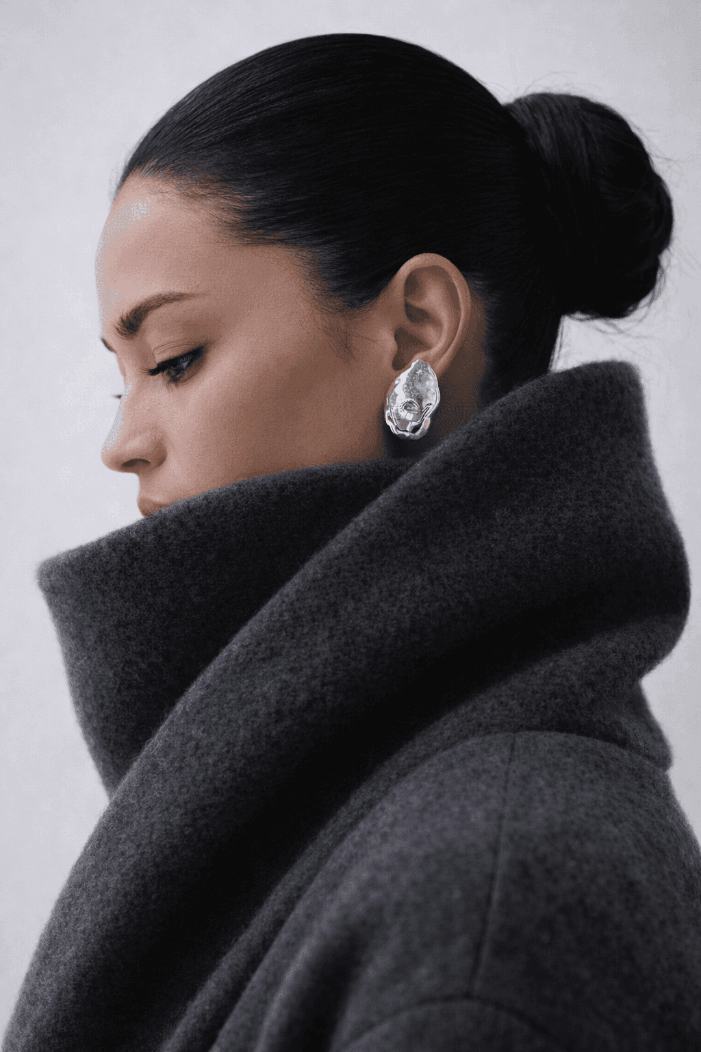 Black and white photo of man posing on camera