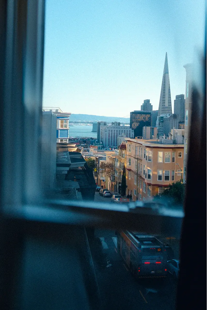 Faro city view through a hotel room window.