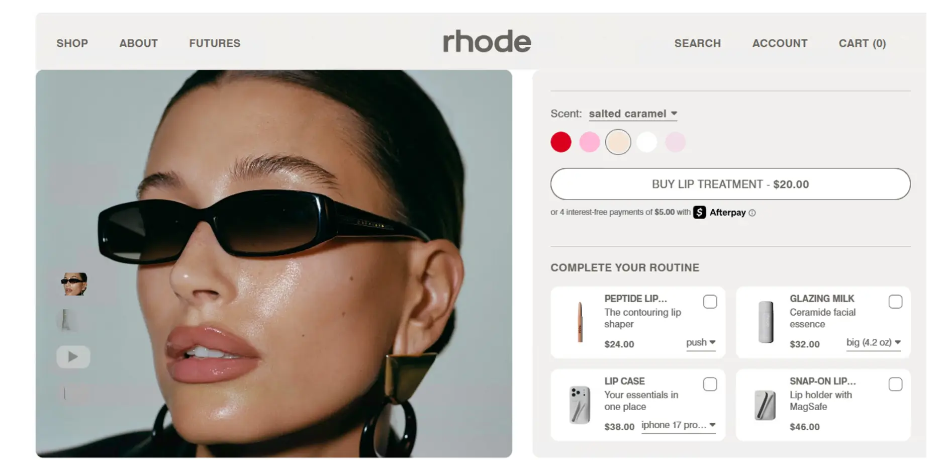 Rhode Peptide Lip Treatment product page featuring Hailey Bieber wearing sunglasses and lip gloss.&nbsp;