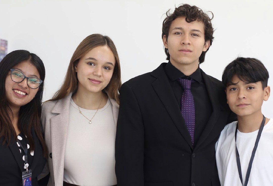 Looking up at a grand domed ceiling with columns