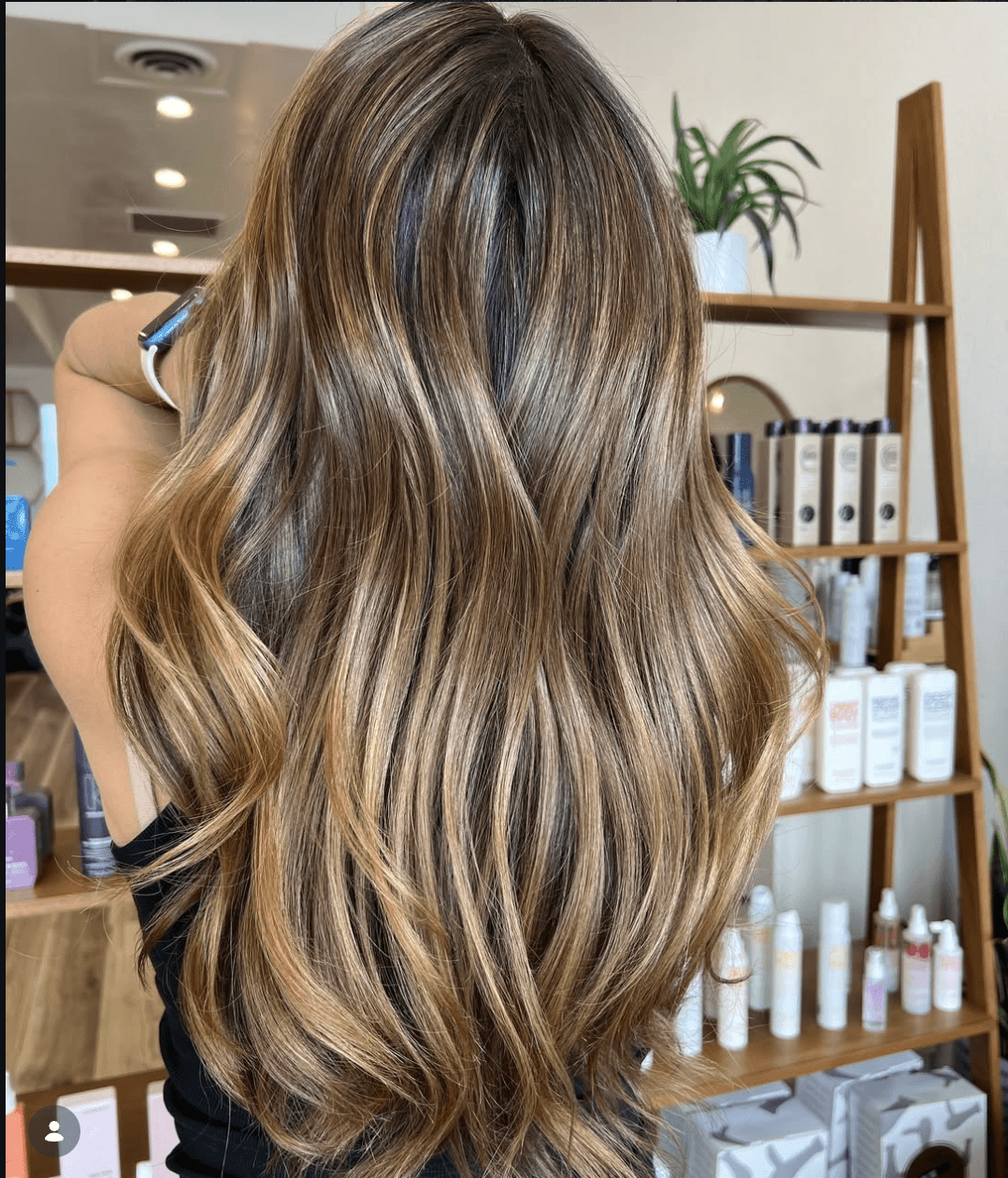 Caramel balayage with warm dimensional tones by Lauren Jojola at Del Sol Hair Studio Huntington Beach