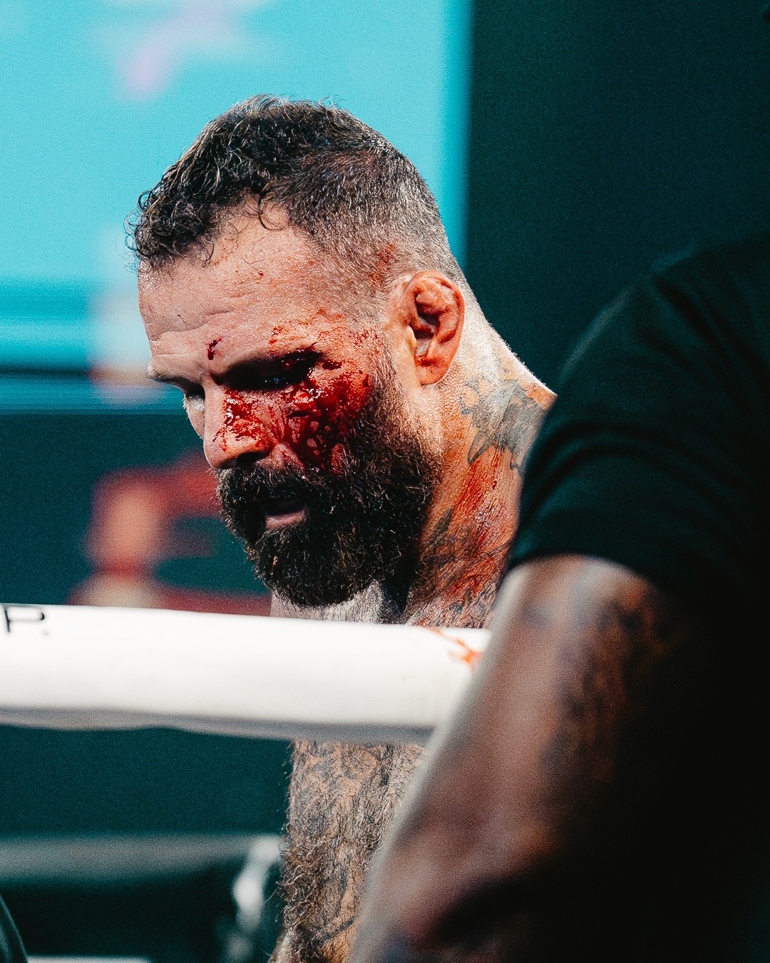 Close-up of a camera lens with a small aperture opening