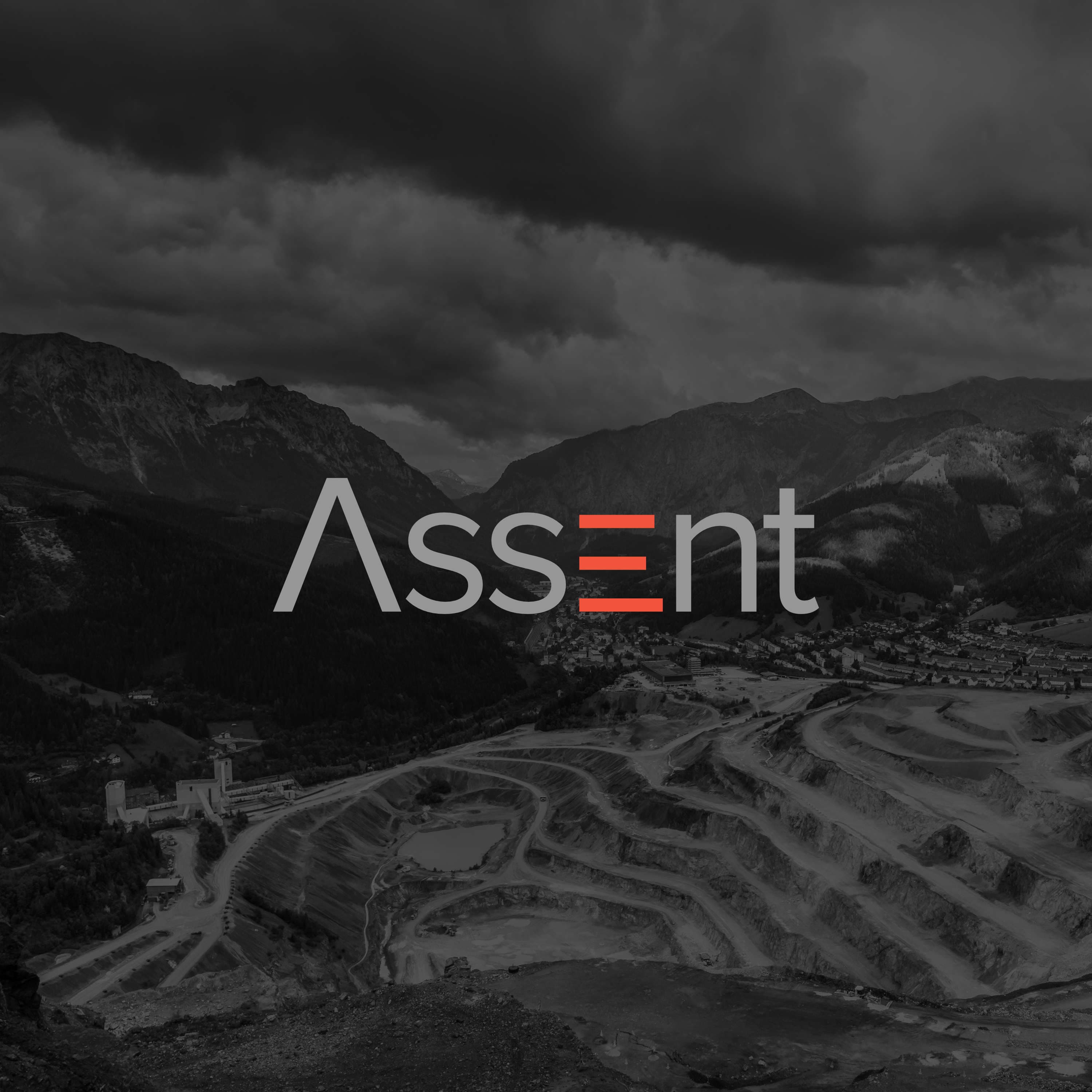 Assent Compliance logo displayed over a dark, desaturated aerial view of a quarry, with the letter 'E' stylized in orange horizontal bars.